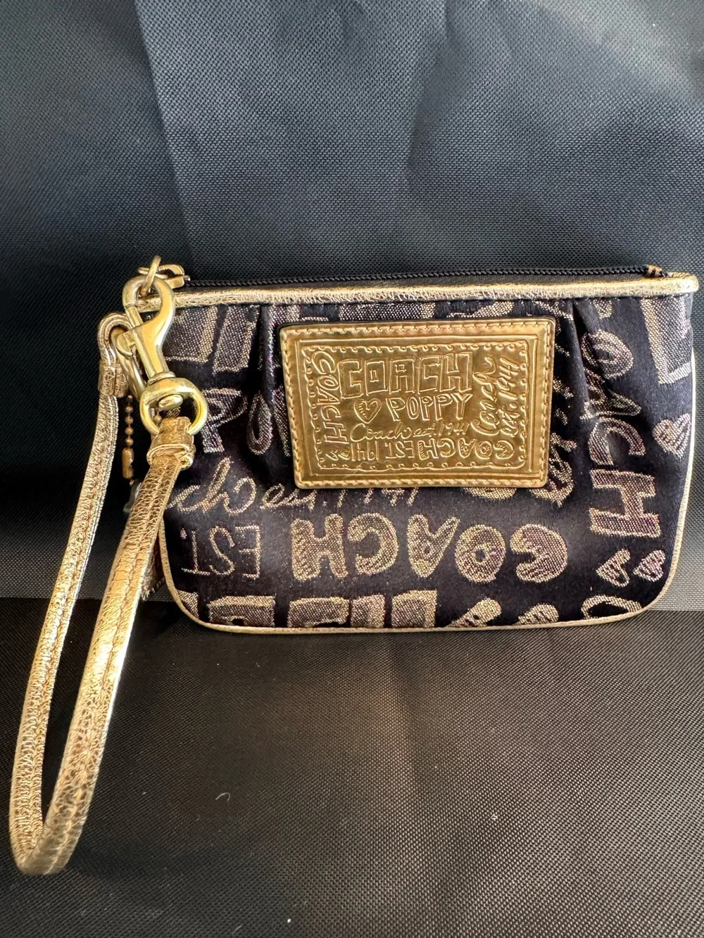 Coach Black Signature Poppy Wristlet with Gold Accents